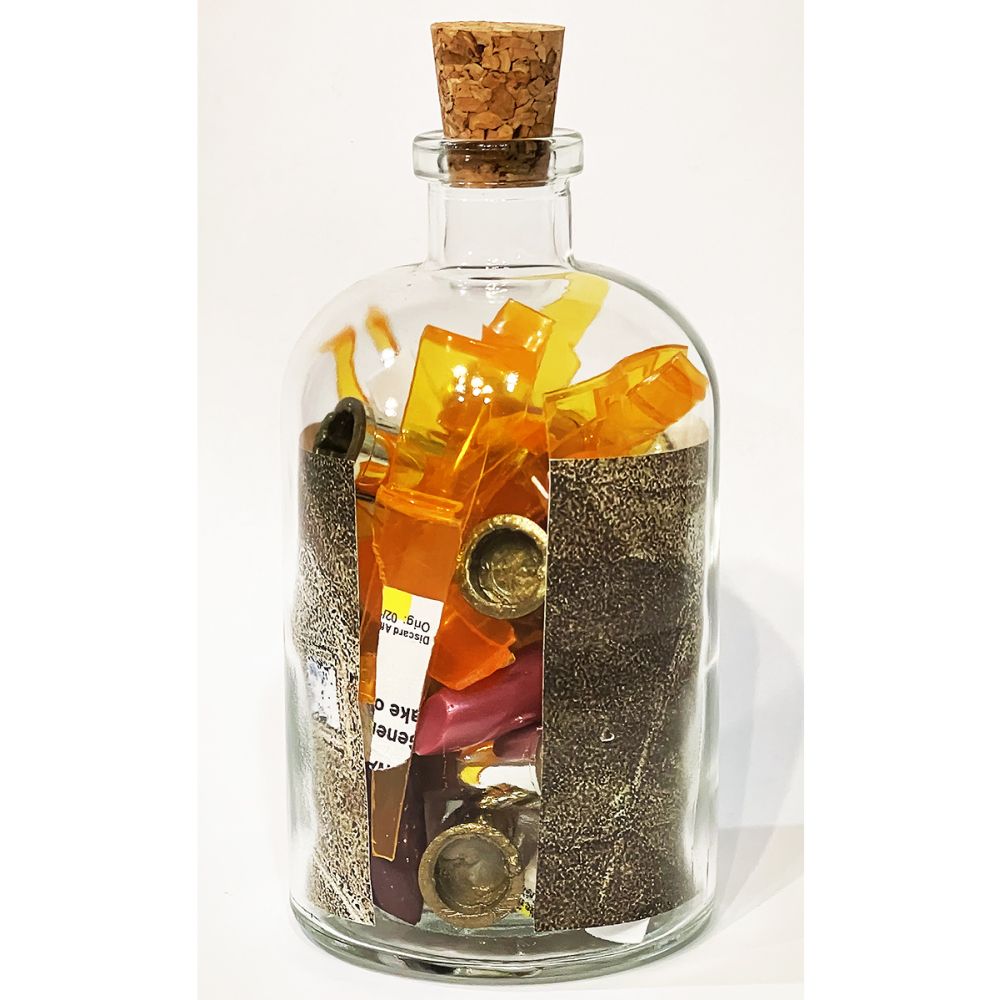 <br/>Kryddost Praetorian back, 10/9/2025<br/>Apx 6½" x 3" x 3"<br/>glass, paper, ink, cork, plastic and acrylic